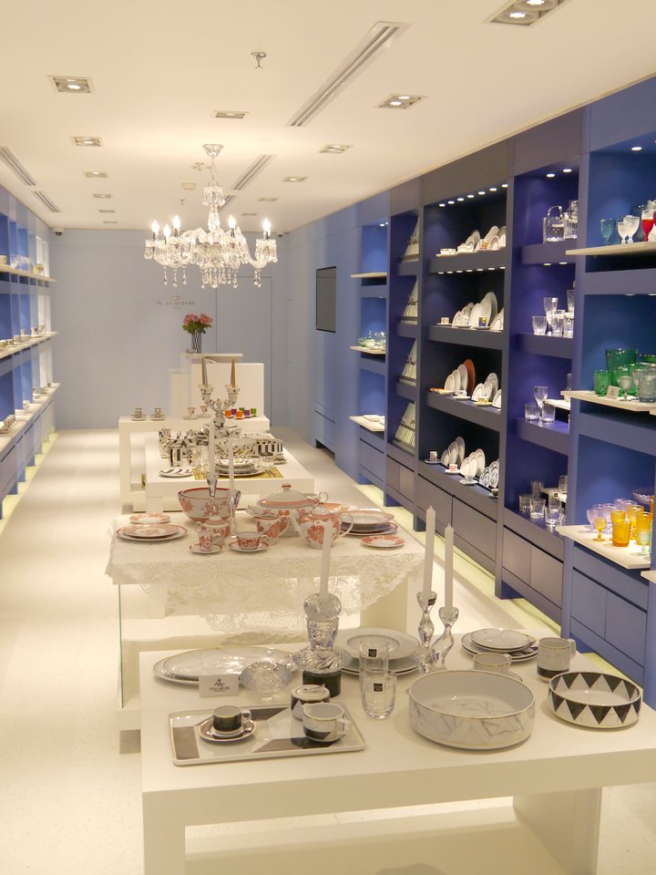 Vista Alegre boutique interior with illuminated display shelving