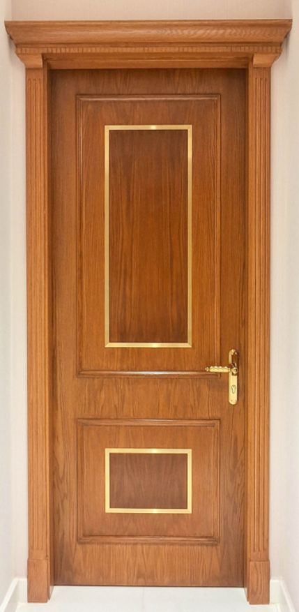 Decorative veneered wooden door with brass inlay