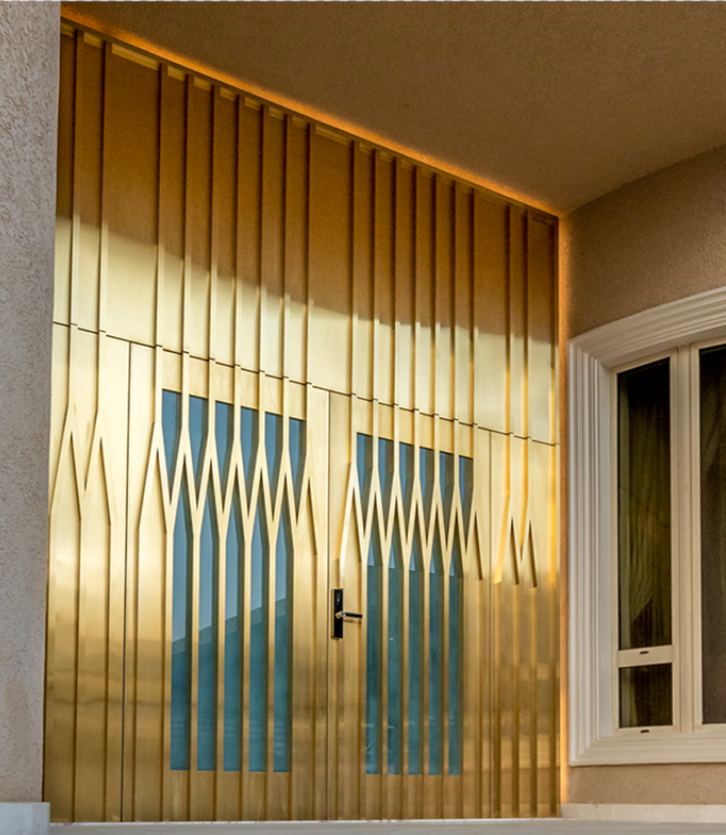 Decorative brass metal feature door