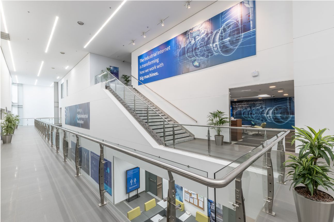 Stainless steel railing along an atrium walkway